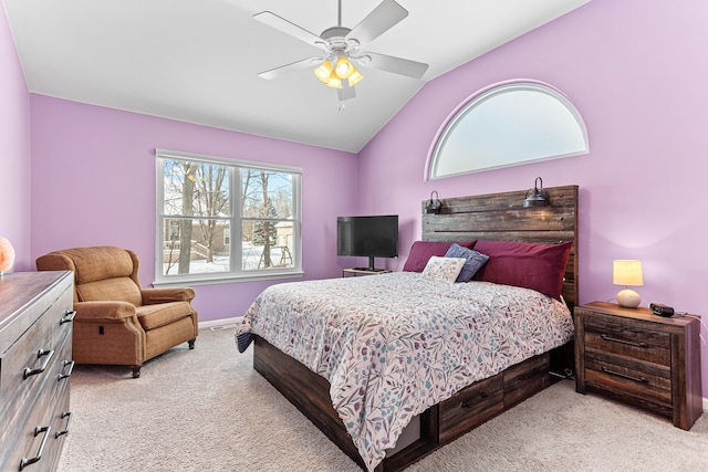 carpeted bedroom featuring ceiling fan and lofted ceiling