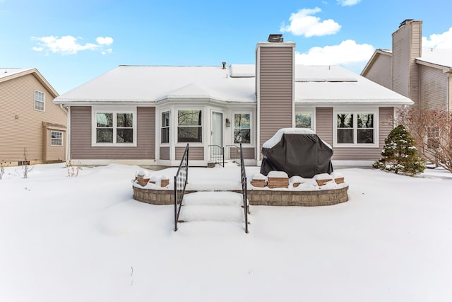 view of snow covered property