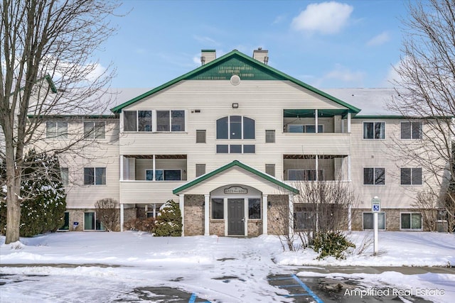 view of snow covered property