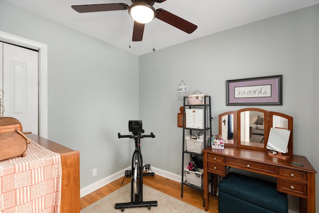 workout area featuring light wood-type flooring