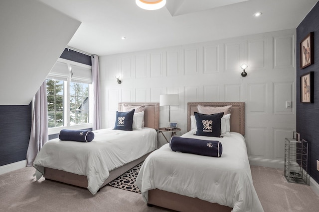 bedroom featuring baseboards, recessed lighting, and light colored carpet