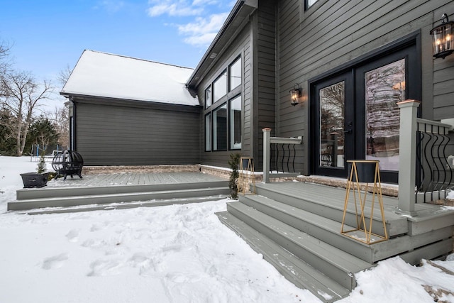 view of snow covered deck