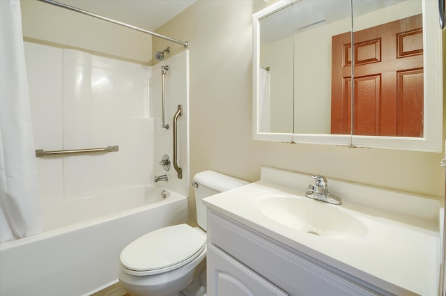 bathroom featuring toilet, bathing tub / shower combination, and vanity