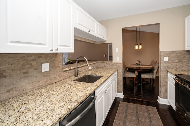 kitchen featuring dishwashing machine, a sink, white cabinets, hanging light fixtures, and stainless steel electric range oven