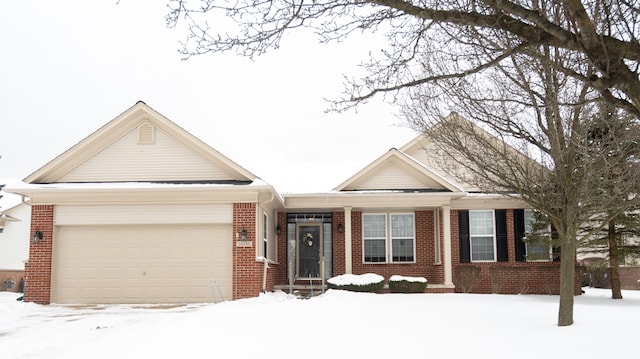 single story home with brick siding and an attached garage