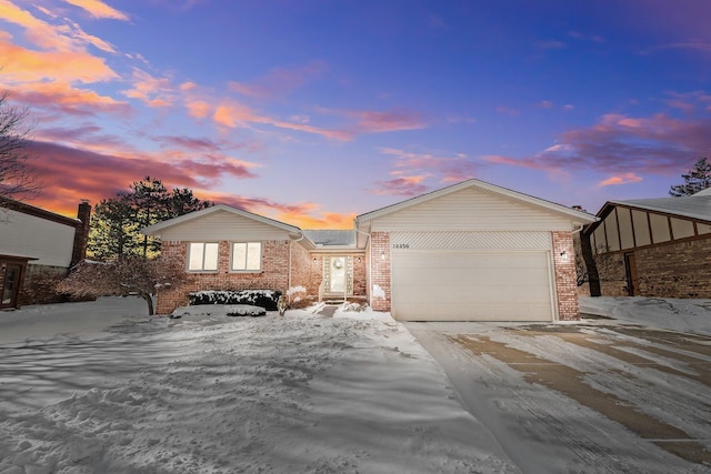 view of front of property featuring a garage