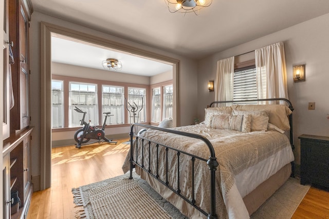 bedroom featuring light wood-type flooring