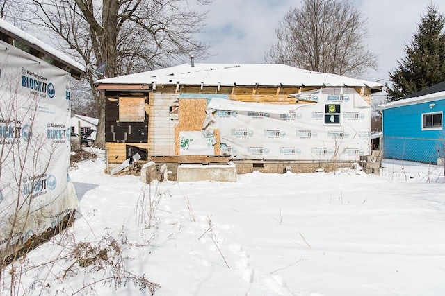 view of snow covered property