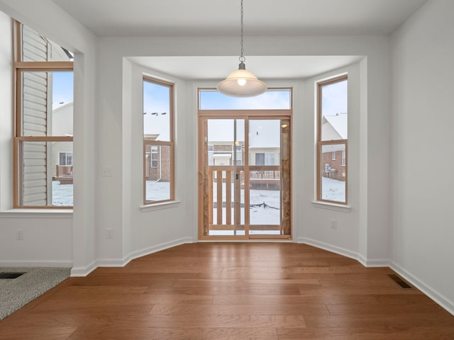 doorway featuring dark hardwood / wood-style floors