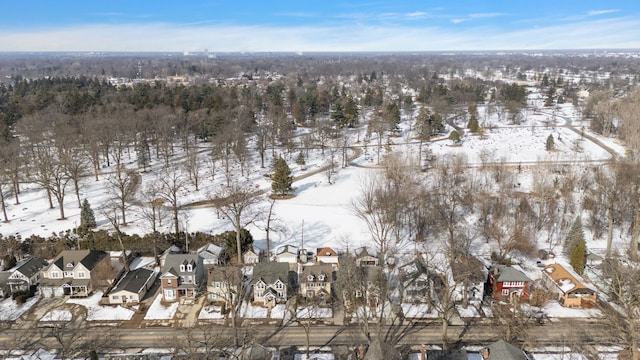 snowy aerial view featuring a residential view