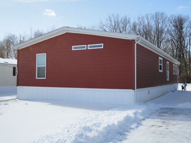 view of snow covered property