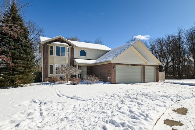 traditional-style home featuring brick siding and a garage