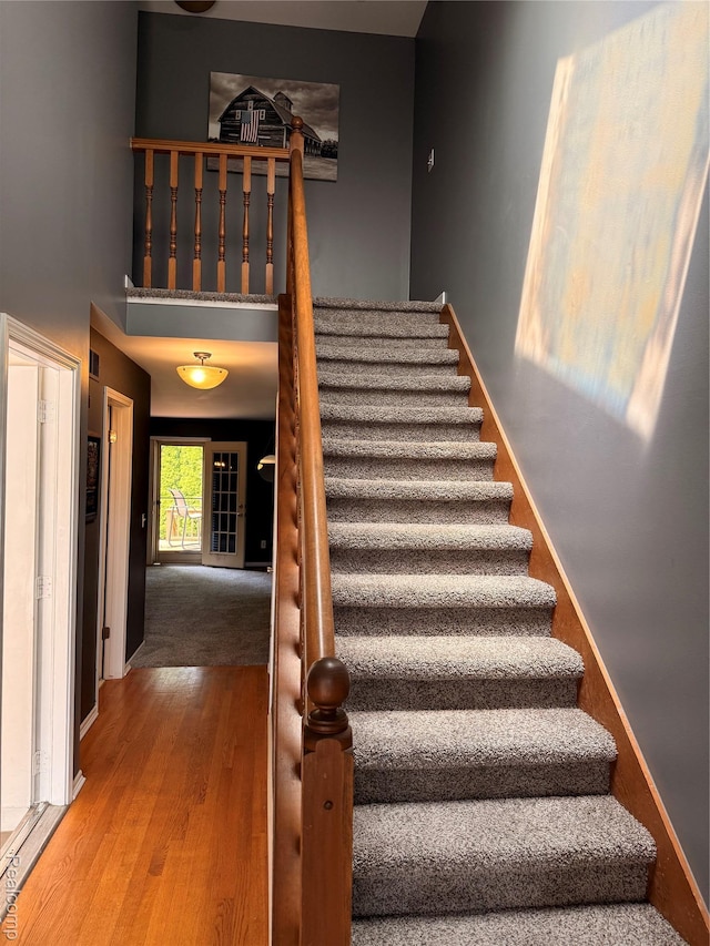 42201 Hidden Brook Dr Unit 68, Clinton Township, MI 48038 - staircase with wood finished floors and baseboards