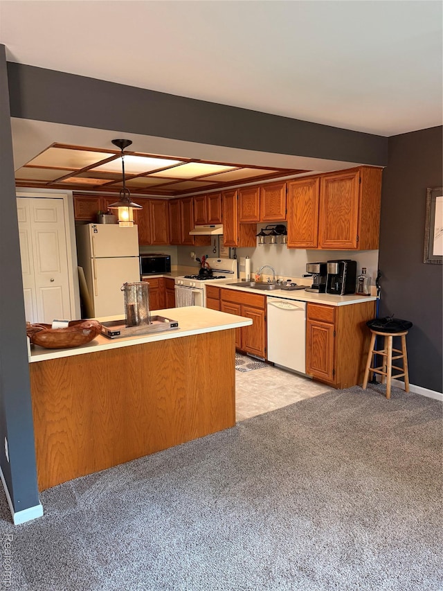 42201 Hidden Brook Dr Unit 68, Clinton Township, MI 48038 - kitchen featuring white appliances, under cabinet range hood, light countertops, brown cabinetry, and a peninsula