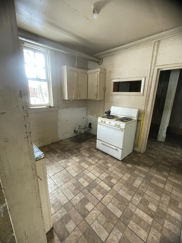 kitchen featuring white gas range oven