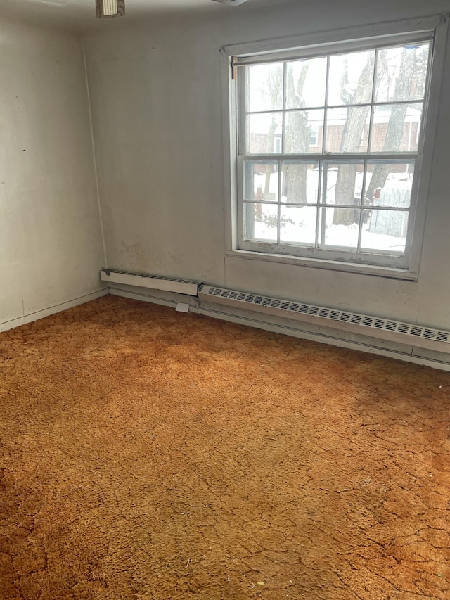 spare room featuring a baseboard radiator