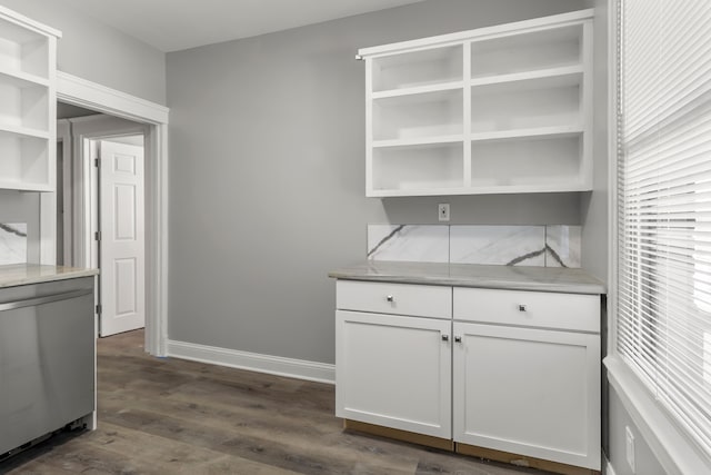 kitchen featuring fridge, white cabinets, and dark hardwood / wood-style floors