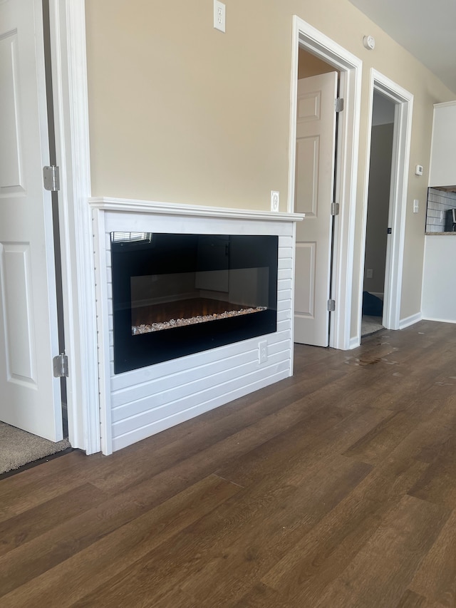 interior details with hardwood / wood-style flooring