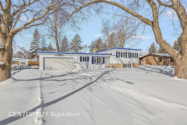 view of front of home featuring a garage