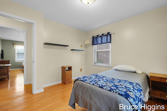 bedroom featuring light hardwood / wood-style floors