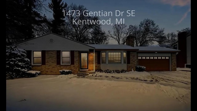 view of front of home with a garage