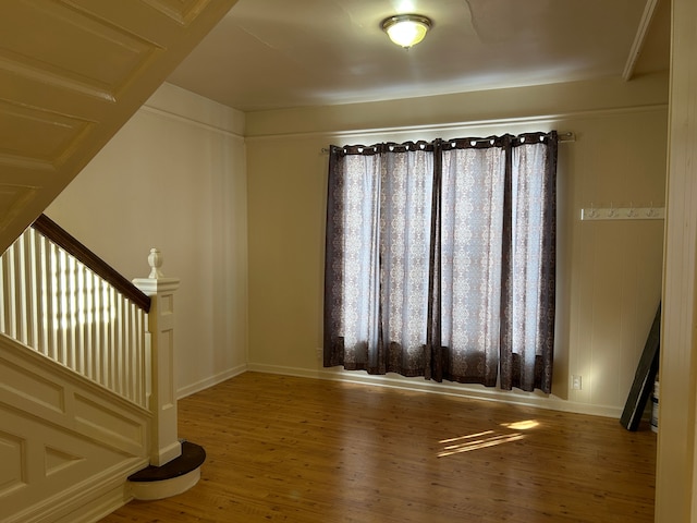 spare room featuring hardwood / wood-style floors