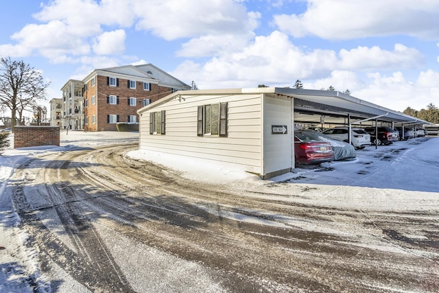 exterior space featuring a carport