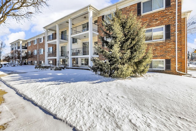 view of snow covered property