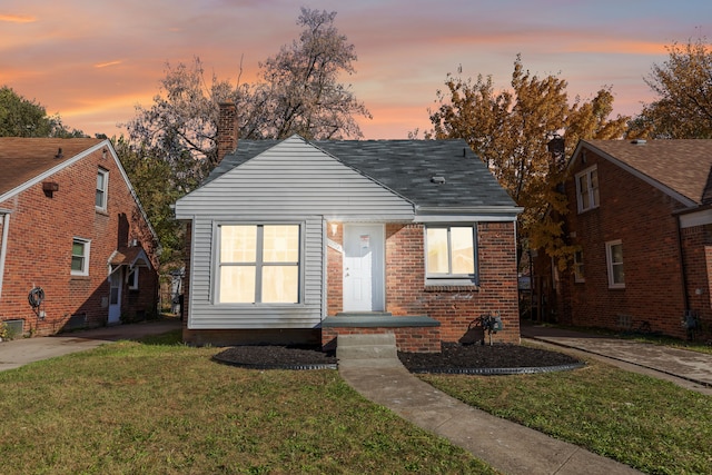 bungalow with a lawn