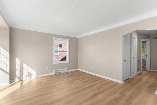 empty room with light wood-type flooring