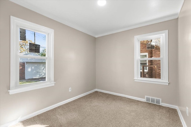 view of carpeted spare room