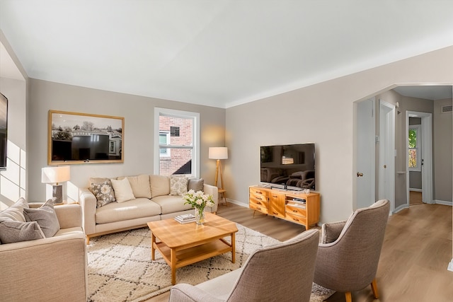 living room featuring light hardwood / wood-style floors