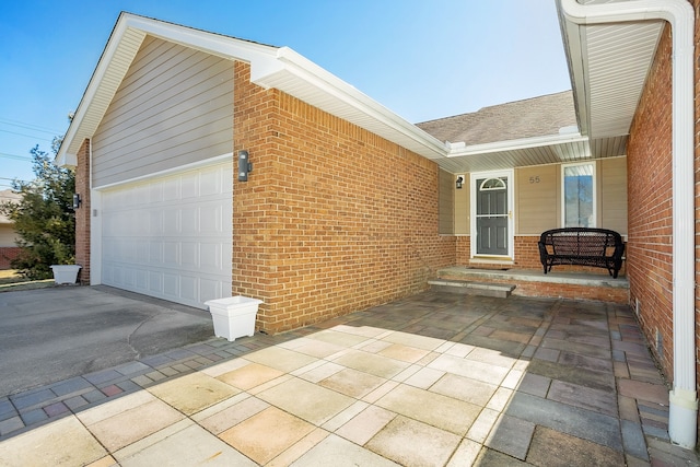 exterior space with a garage and driveway