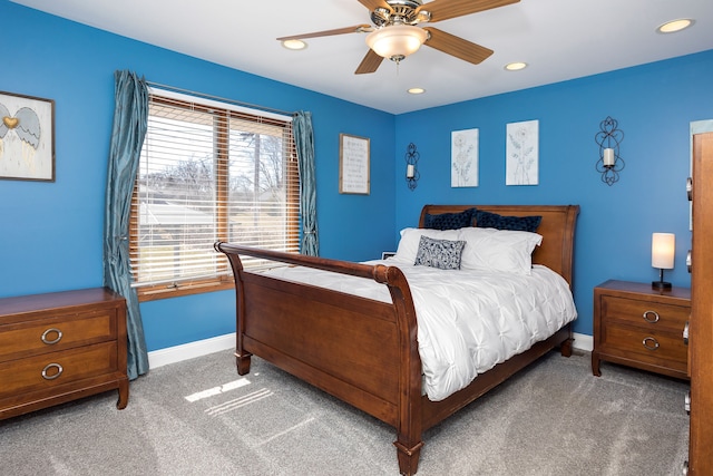 carpeted bedroom featuring recessed lighting, ceiling fan, and baseboards