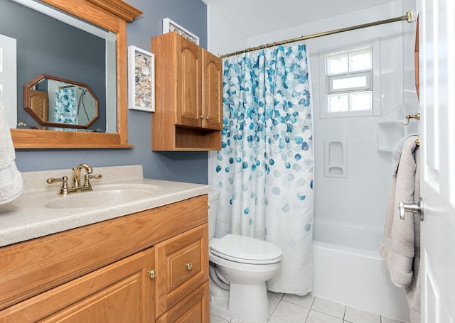 bathroom with vanity, tile patterned floors, toilet, and shower / tub combo with curtain