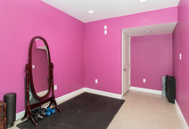 workout area with recessed lighting and baseboards