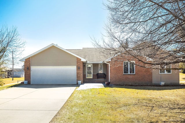 ranch-style home featuring a front yard, an attached garage, brick siding, and driveway