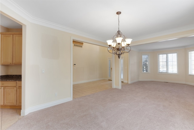 unfurnished dining area with light colored carpet, crown molding, and visible vents