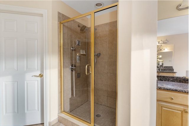 bathroom featuring a shower stall