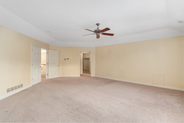 unfurnished room featuring visible vents, ceiling fan, light carpet, and baseboards