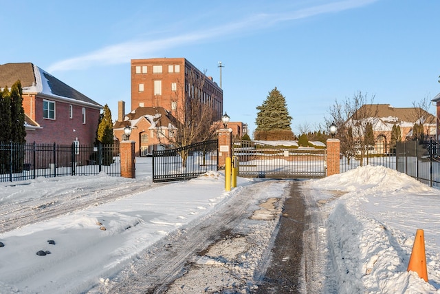 view of road with a gate and a residential view