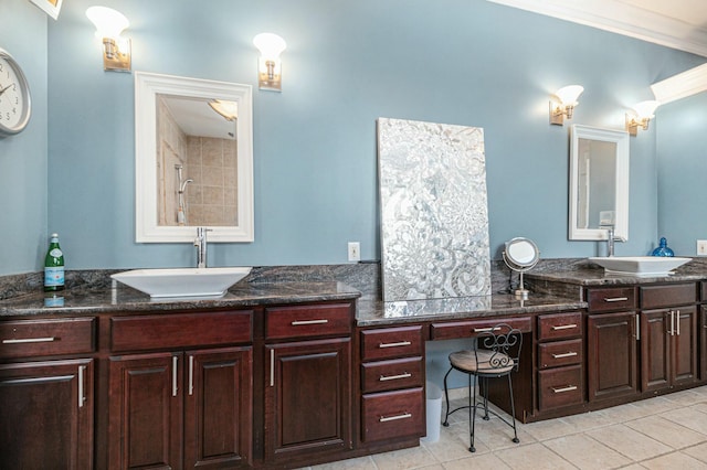 bathroom with ornamental molding, tile patterned flooring, and vanity