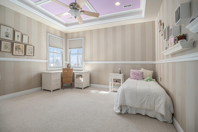 bedroom with wallpapered walls, baseboards, visible vents, a raised ceiling, and crown molding