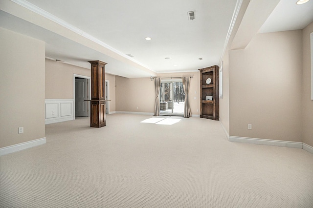 unfurnished room with light carpet, recessed lighting, visible vents, and baseboards