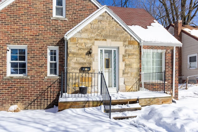 view of snow covered property