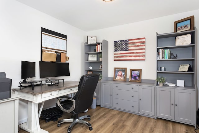 office space with wood finished floors