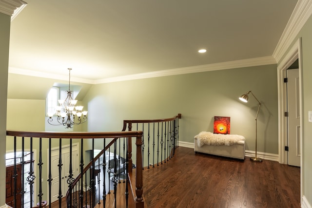 corridor featuring crown molding, an inviting chandelier, and dark wood-type flooring