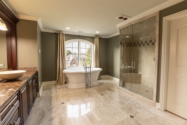 bathroom with shower with separate bathtub, vanity, and ornamental molding