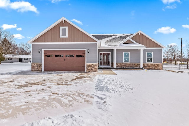 craftsman-style home with a garage