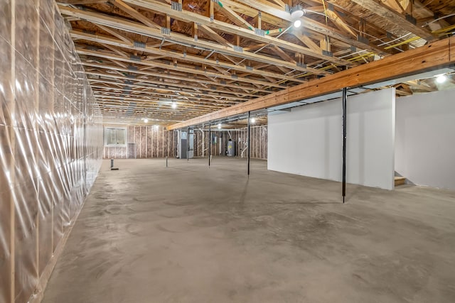 basement featuring water heater